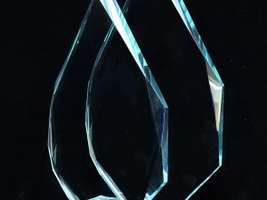 Two triangular shaped glass awards with rectangle bases from Awards By Hammond